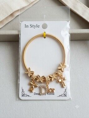 Gold Floral Charm Bracelet with Pendant
